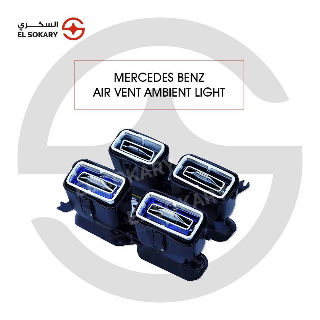 A set of four rectangular Mercedes-Benz GLS air vents featuring high-gloss black housing, polished chrome inner slats, and integrated blue LED ambient lighting.