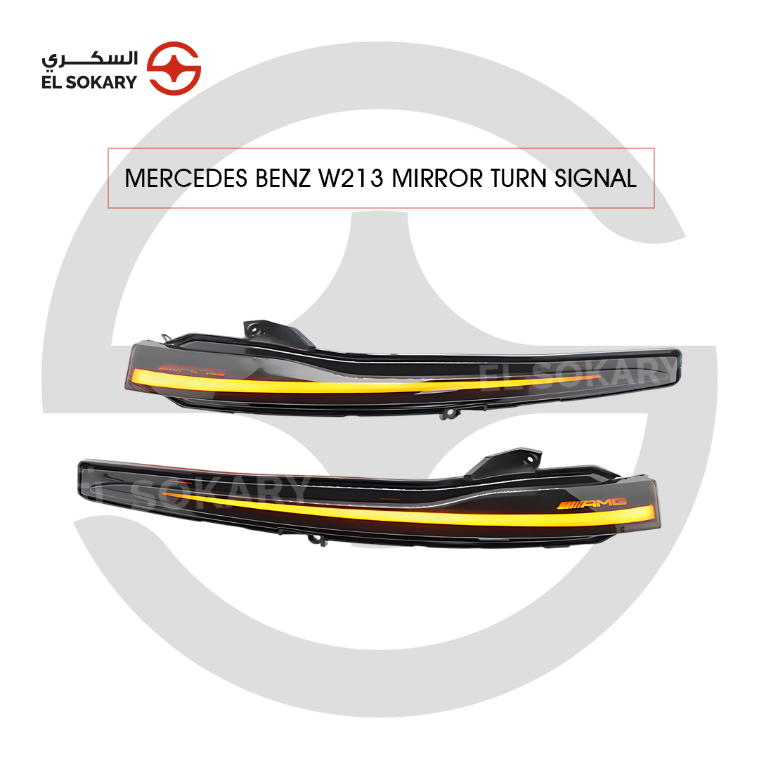 Mercedes-Benz W213 A pair of smoked-lens dynamic LED mirror turn signal indicators, featuring a glowing amber sequential light strip and the AMG logo.