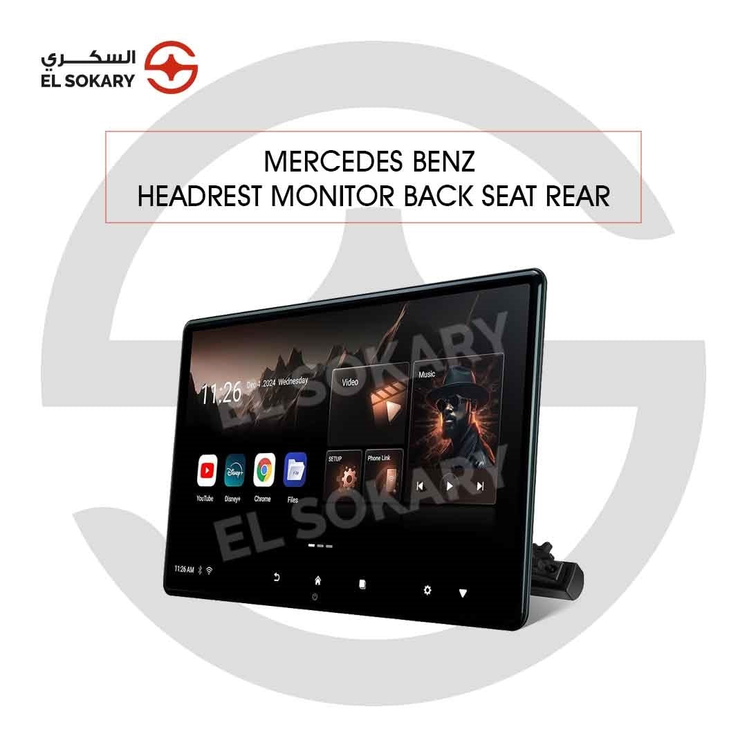 A large, high-definition Mercedes-Benz GLK rear seat headrest monitor displaying a multimedia home screen with apps like YouTube, Disney+, and Chrome.
