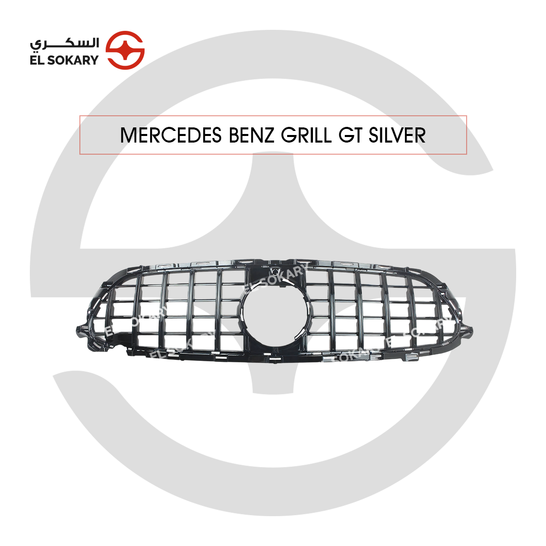 Front view of a Mercedes-Benz W213 E-Class GT Panamericana style grill featuring vertical silver-accented slats and a central emblem mounting point.