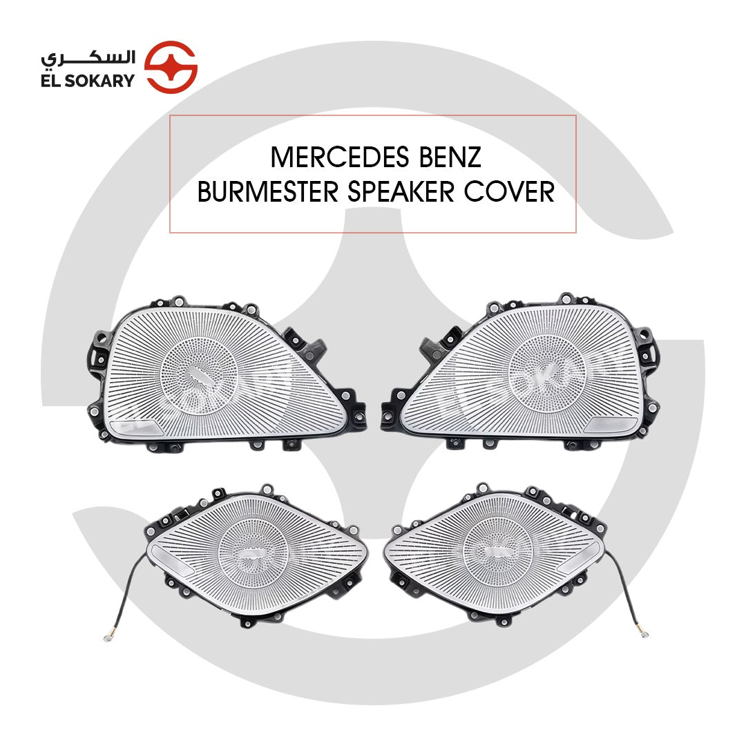 A four-piece set of silver Mercedes-Benz GLE Burmester-style speaker covers featuring a signature radial perforated pattern and polished metallic finish for front and rear doors.